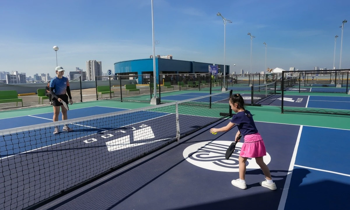 Pickleball enthusiasts engage in a friendly game at SM City Sta. Mesa.