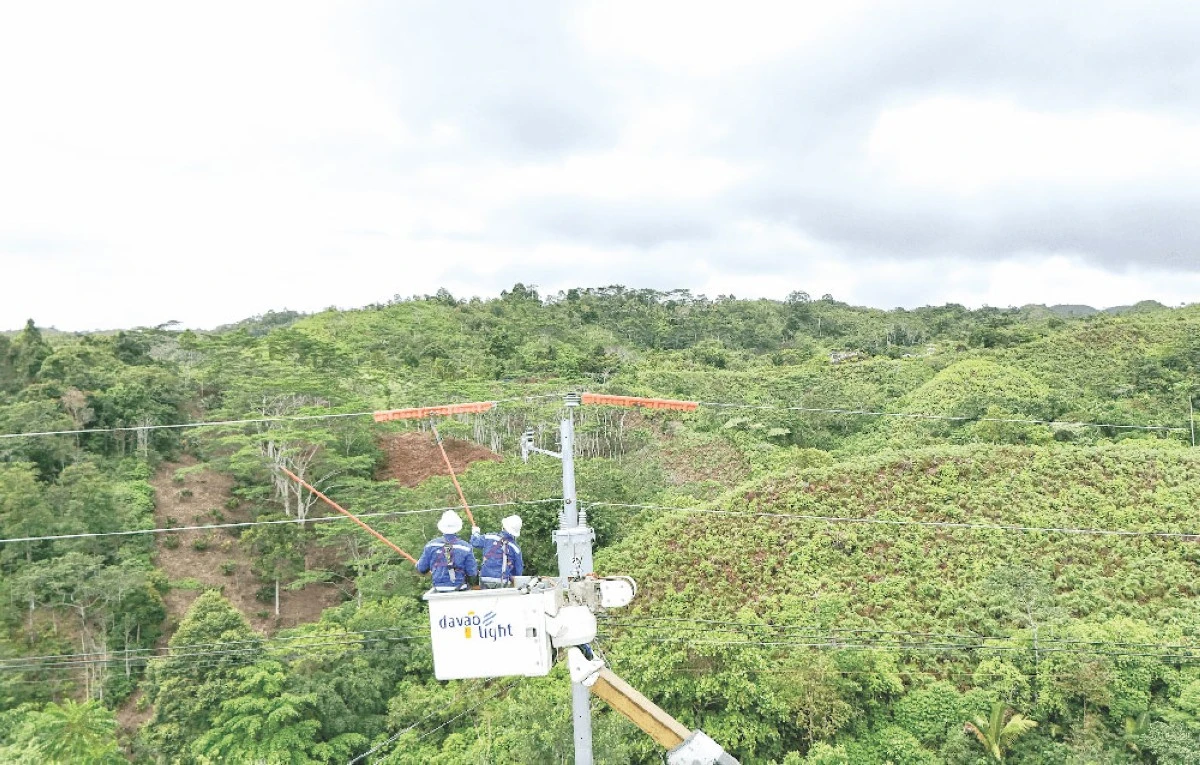 SITIO ELECTRIFICATION The improved peace and order situation in Davao City allowed Davao Light to erect and install power lines and other infrastructure to finally energize Barangay Malabog and other underserved areas.