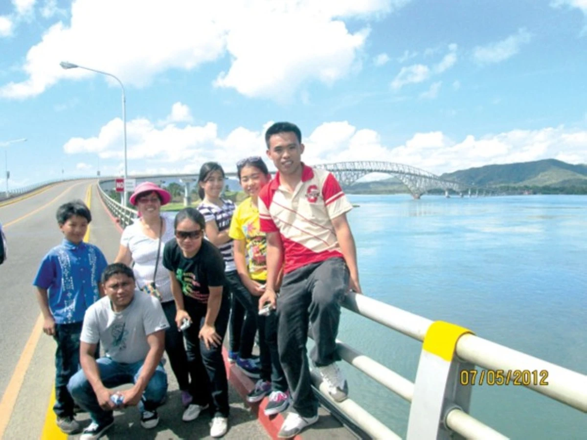 MARTES CALASAN (right) is a dedicated teacher who has mastered his role as a school paper adviser in Kibungan, Benguet. Calasan and his students have traveled around the country to join national writing competitions.