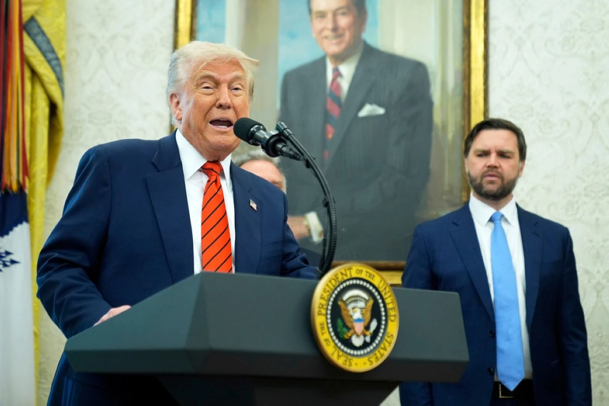 President Donald Trump speaks before Steve Witkoff is sworn as special envoy during a ceremony in the Oval Office of the White House, Tuesday, May 6, 2025, in Washington, as Vice President JD Vance watches. (AP Photo/Mark Schiefelbein)