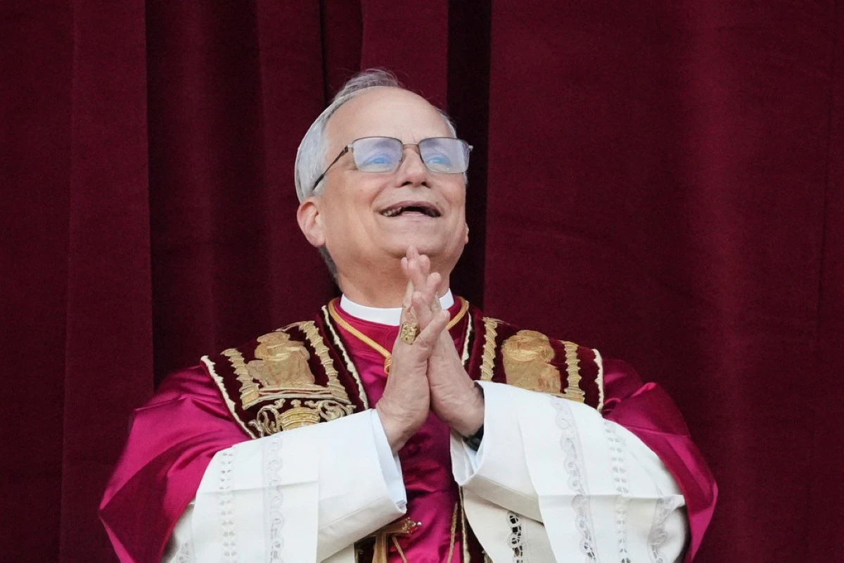 Newly elected Pope Leo XIV appears at the balcony of St. Peter's Basilica at the Vatican, Thursday, May 8. (AP Photo/Alessandra Tarantino)