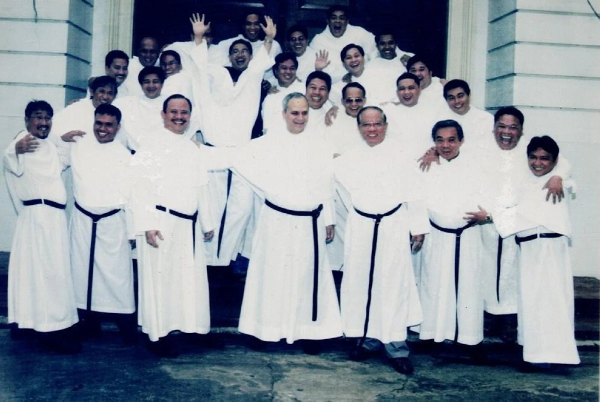 FR. Robert Francis Prevost (center), the future Pope Leo XIV), with Augustinian priests at the main campus of the University of San Agustin in Iloilo City during a visit in 2006.  (University of San Agustin)