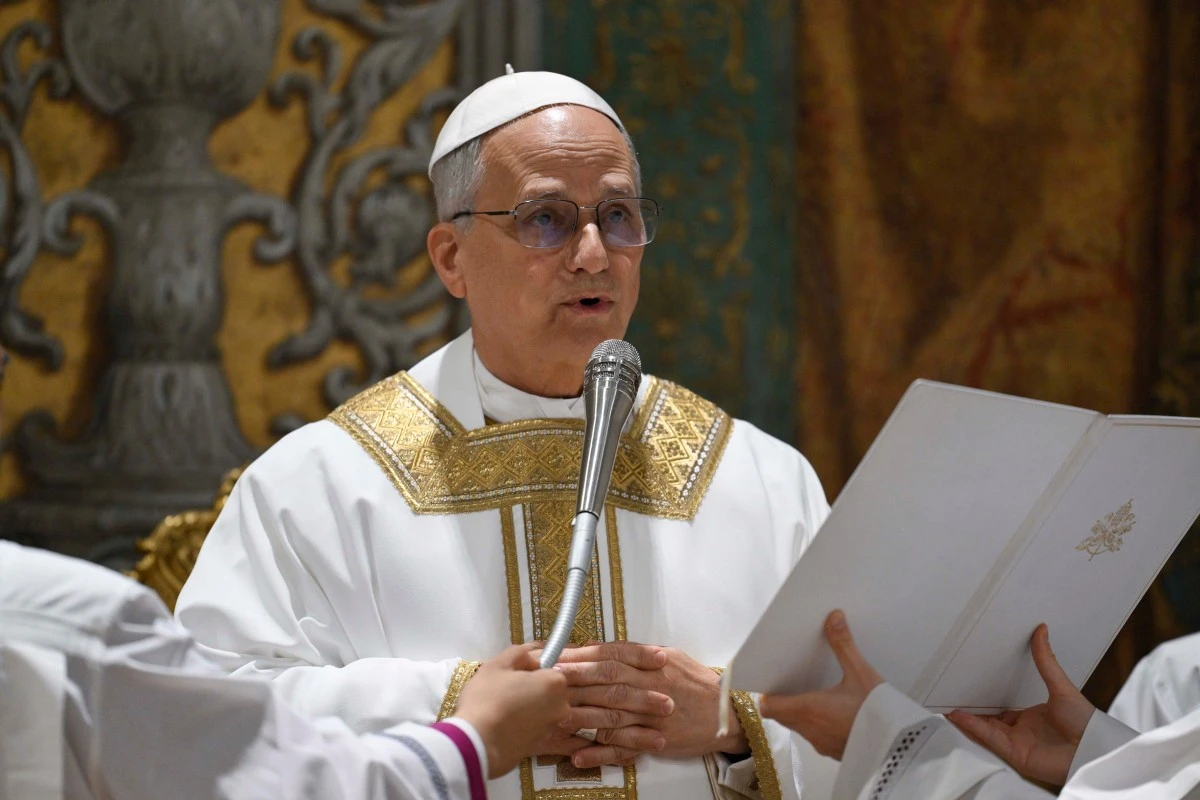 Newly elected Pope Leo XIV concelebrates Mass with the College of Cardinals inside the Sistine Chapel at the Vatican the day after his election as 267th pontiff of the Roman Catholic Church, Friday, May 9, 2025. (Vatican Media via AP)