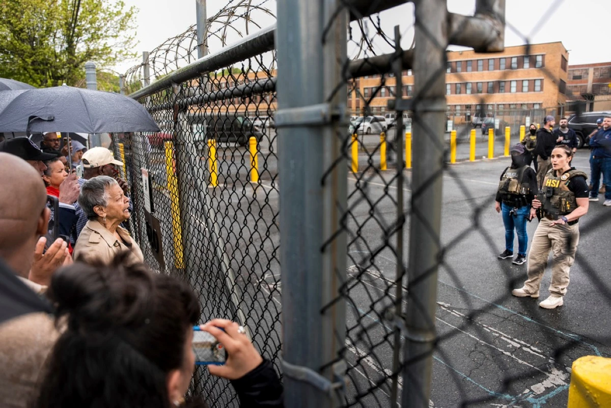 Rep. Bonnie Watson Coleman, D-N.J., speaks with an officer demanding she be let into the ICE Detention office after the arrest of Newark Mayor Ras Baraka, Friday, May 9, 2025, in Newark, N.J. (AP Photo/Angelina Katsanis)