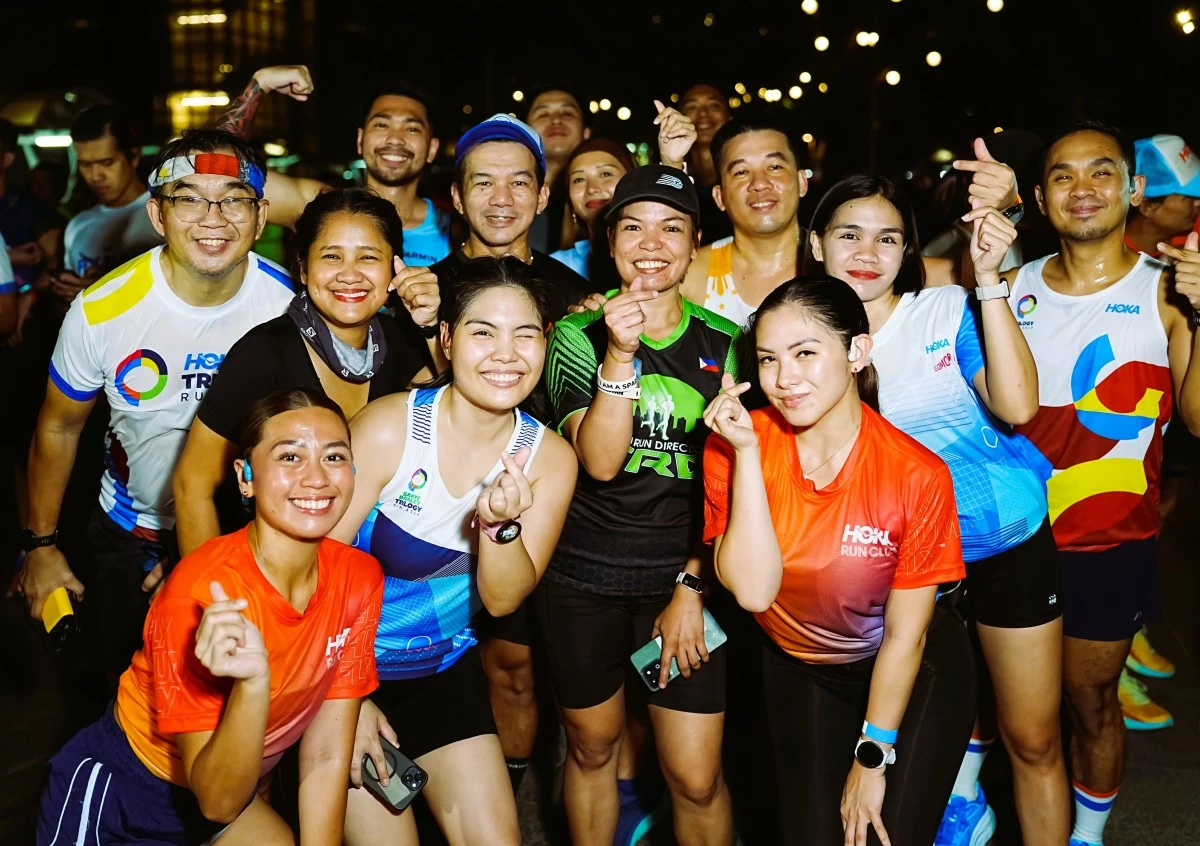 Celebrity runner and actress Ashley Rivera (lower right) joins participants in the recent HOKA Run Club held at the Ayala Triangle Gardens in Makati. 