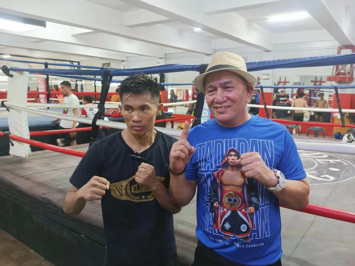 Pedro Taduran, left, and coach Jonathan Peñalosa.