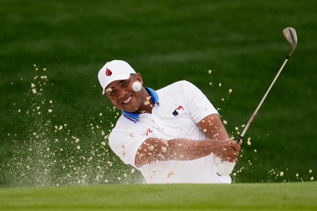 Jhonattan Vegas, of Venezuela, hits from the bunker on the 18th hole during the second round of the PGA Championship golf tournament at the Quail Hollow Club, Friday, May 16, in Charlotte, N.C. (AP Photo/George Walker IV)