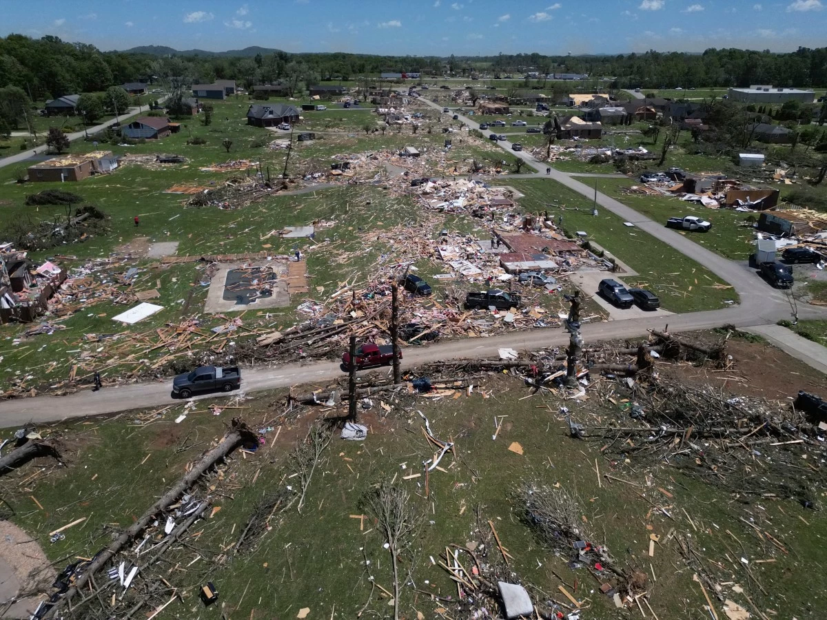 A home is destroyed after a severe storm passed through the area Saturday, May 17, 2025, in London, Ky (AP Photo/Carolyn Kaster)