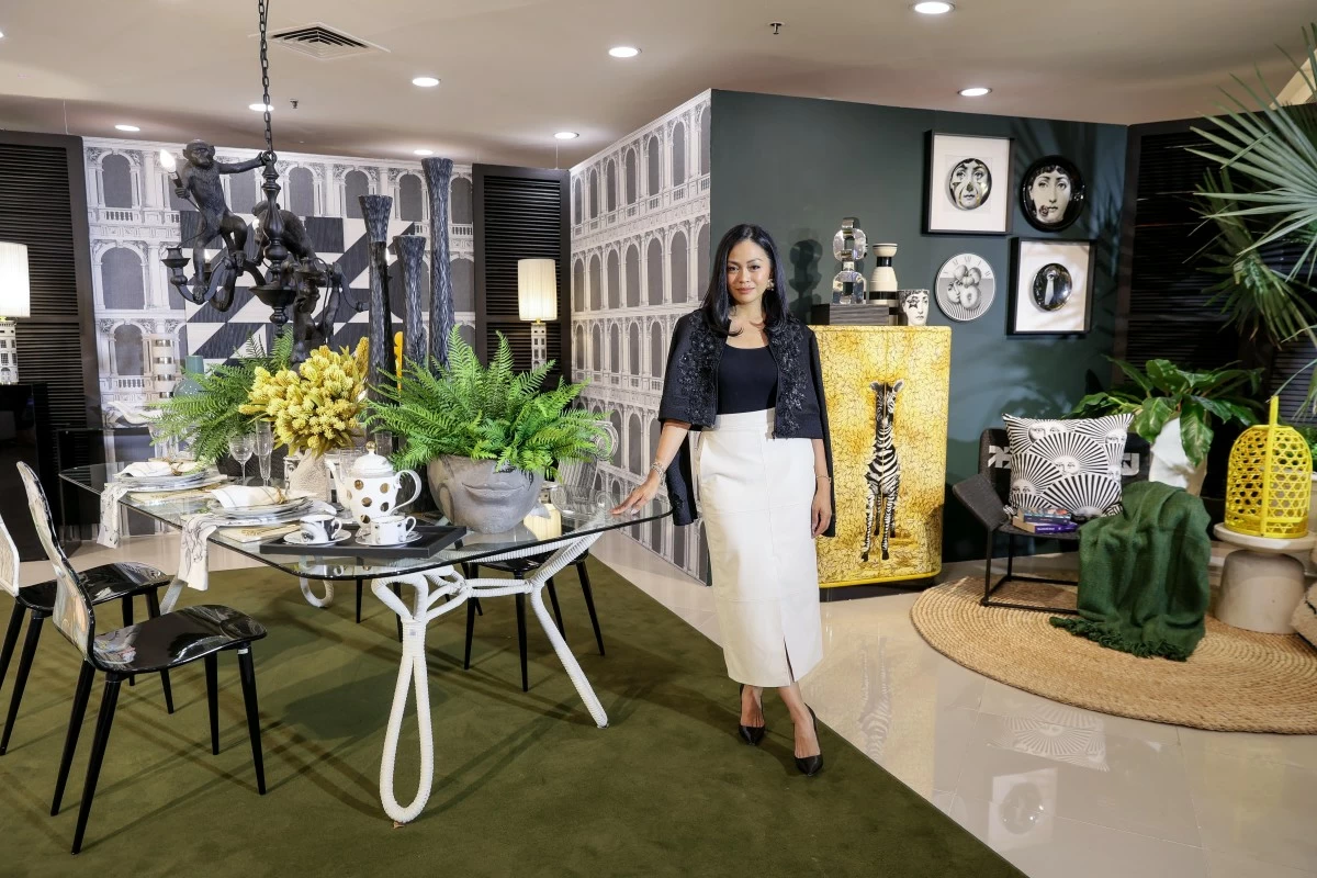 IDr. Cyndi Fernandez-Beltran with her curated vignette 'La Dolce Isla' that explores the fusion of European elegance and Filipino craftsmanship.