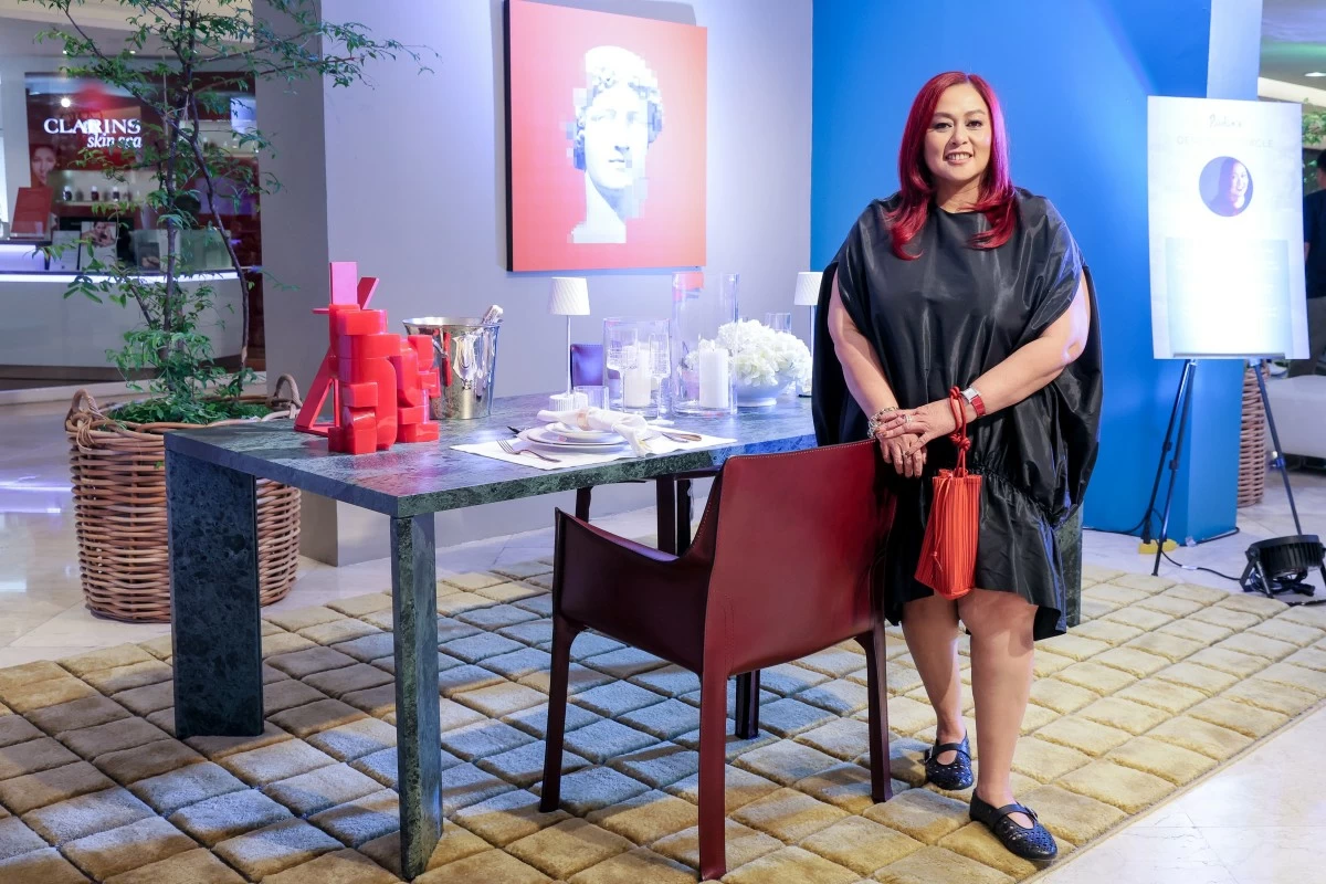 IDr. Cecil P. Ravelas and her curated living and dining room vignette that captures the heart of hospitality.