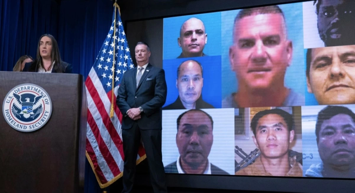 Deputy director of U.S. Immigration and Customs Enforcement Madison Sheahan, flanked by Acting director of U.S. Immigration and Customs Enforcement (ICE) Todd Lyons, speaks during a news conference at ICE Headquarters, in Washington, Wednesday, May 21, 2025. (AP Photo/Jose Luis Magana)