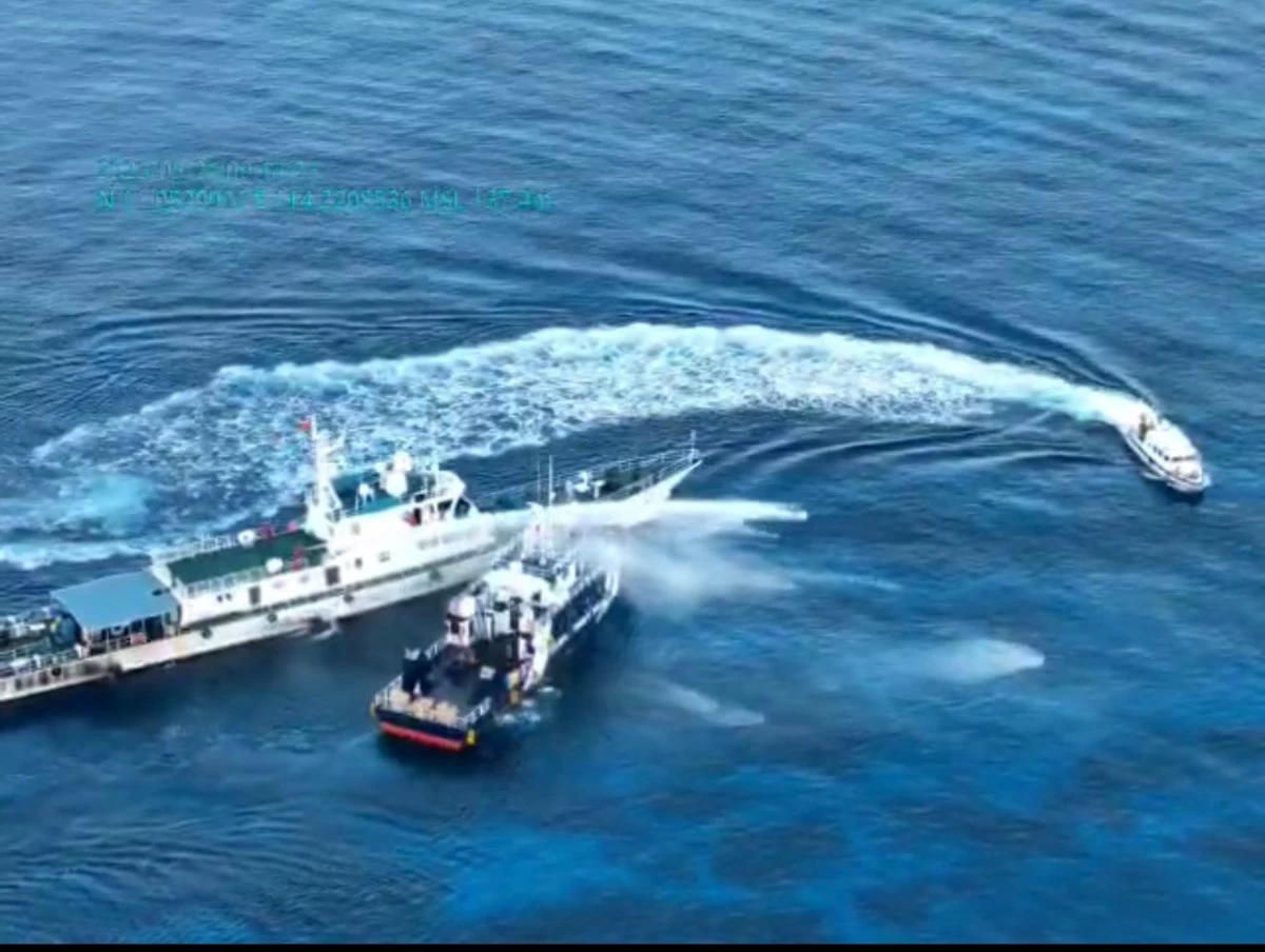 A Chinese Coast Guard vessel is seen firing water cannon on a BFAR vessel in the area of Pagasa Cays on Thursday morning, May 22, 2025