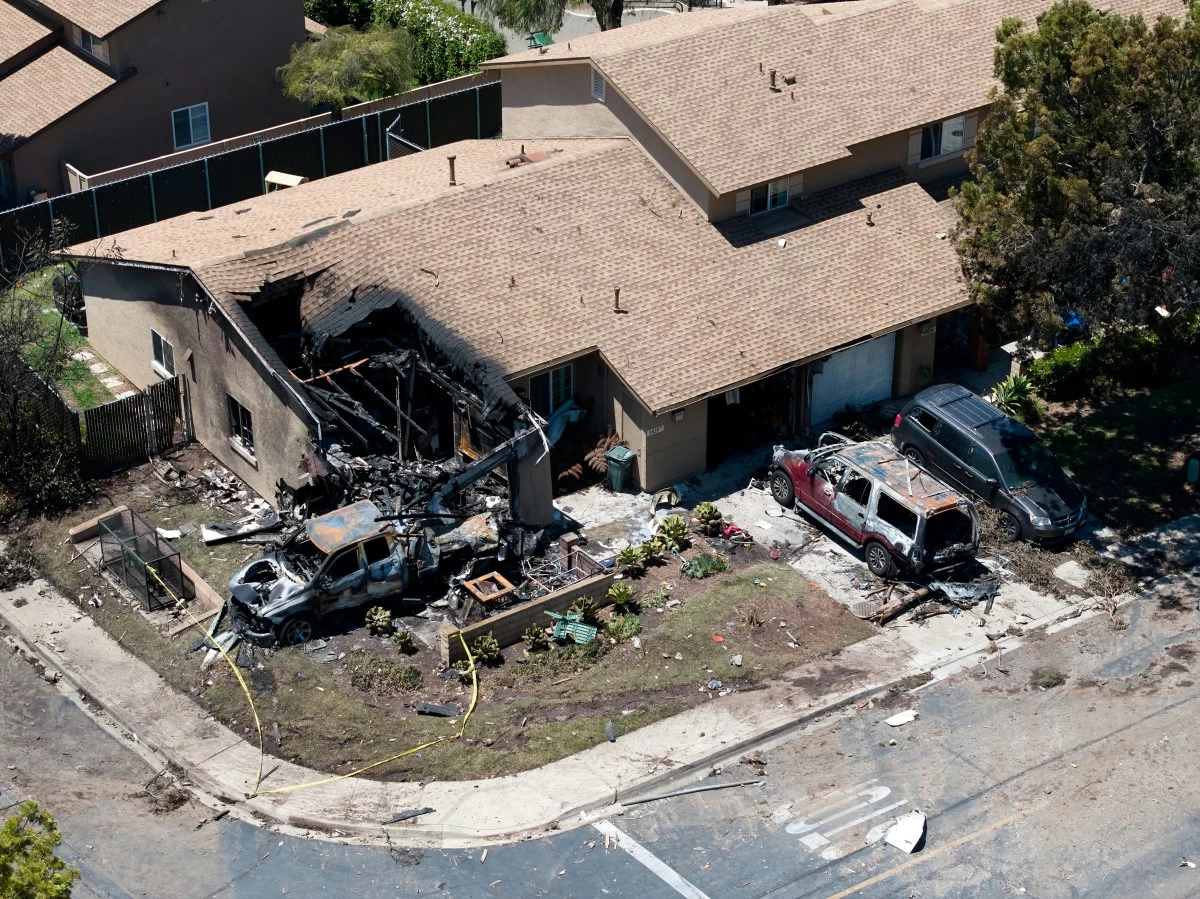 

DEBRIS covers the ground after a small plane crashed into a San Diego neighborhood, setting homes and cars on fire and forcing evacuations early Thursday, May 22, 2025. (AP)
