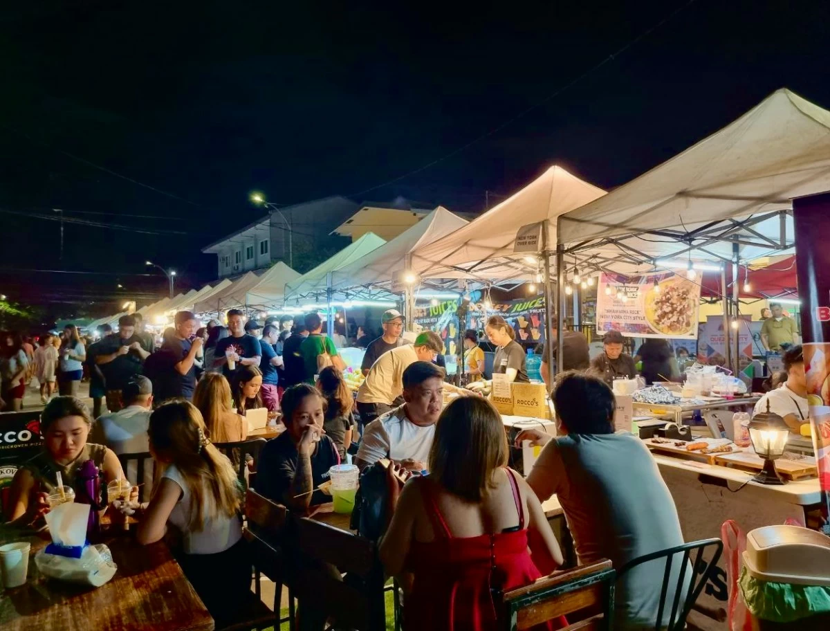 Foodies flock to Maginhawa Street at night for late-night bites and local delights. (Photo from Maginhawa Food Community/Facebook)