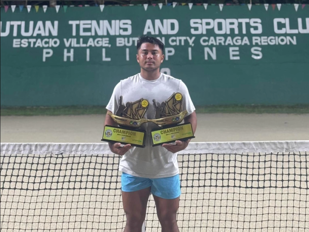 AJ Lim poses with his two trophies after winning the singles and doubles events at the Balangay Open. (AJ Lim Facebook)