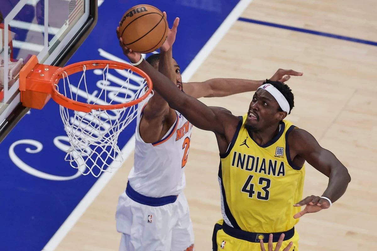 Indiana Pacers forward Pascal Siakam (43) puts up a shot against New York Knicks forward Mikal Bridges (25) during the first quarter of Game 2 of the NBA basketball Eastern Conference final, Friday, May 23, 2025, in New York. (AP Photo/Adam Hunger)