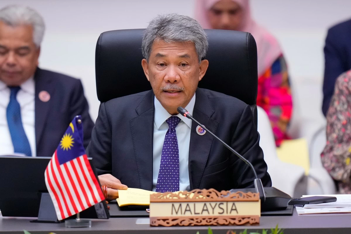 Malaysia's Foreign Minister Mohamad Hasan delivers an opening speech at the opening ceremony of the 46th Association of Southeast Asian Nations (ASEAN) Foreign Ministers' Meeting in Kuala Lumpur, Malaysia, Sunday, May 25, 2025.(AP Photo/Vincent Thian)
