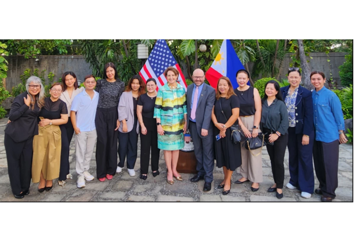 Ambassador MaryKay Carlson, Counselor Michael Ward, and Chef Nancy Reyes-Lumen with the embassy’s media friends