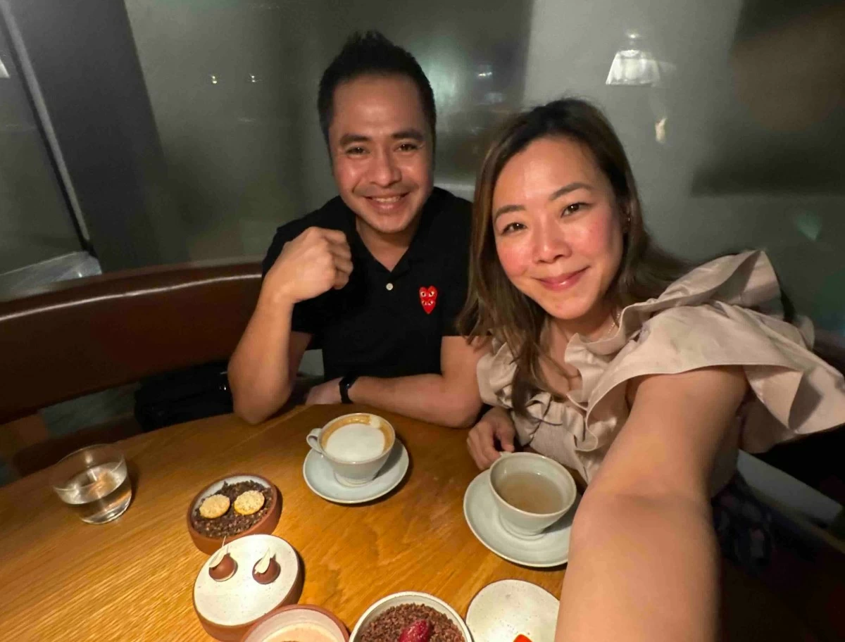 My husband and I enjoying dessert