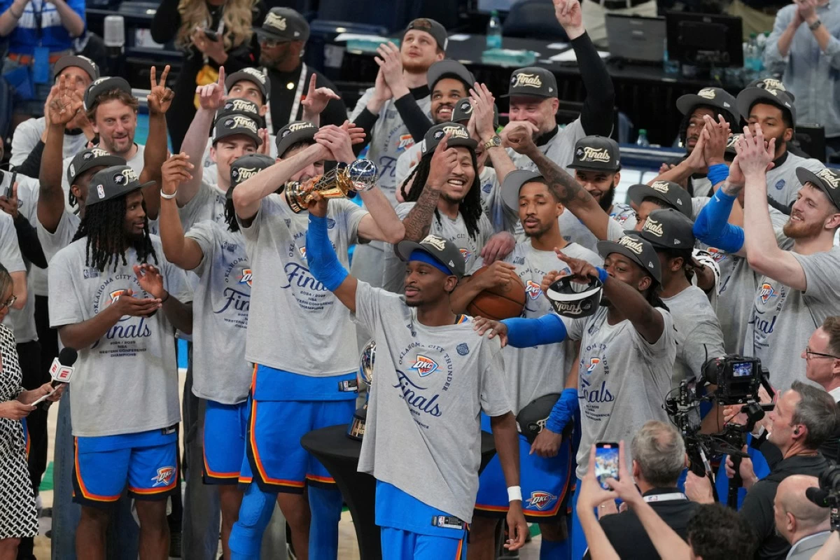 Oklahoma City Thunder guard Shai Gilgeous-Alexander (2), middle, celebrates with teammates after Game 5 of the Western Conference finals of the NBA basketball playoffs against the Minnesota Timberwolves, Wednesday, May 28, 2025, in Oklahoma City. (AP Photo/Kyle Phillips)