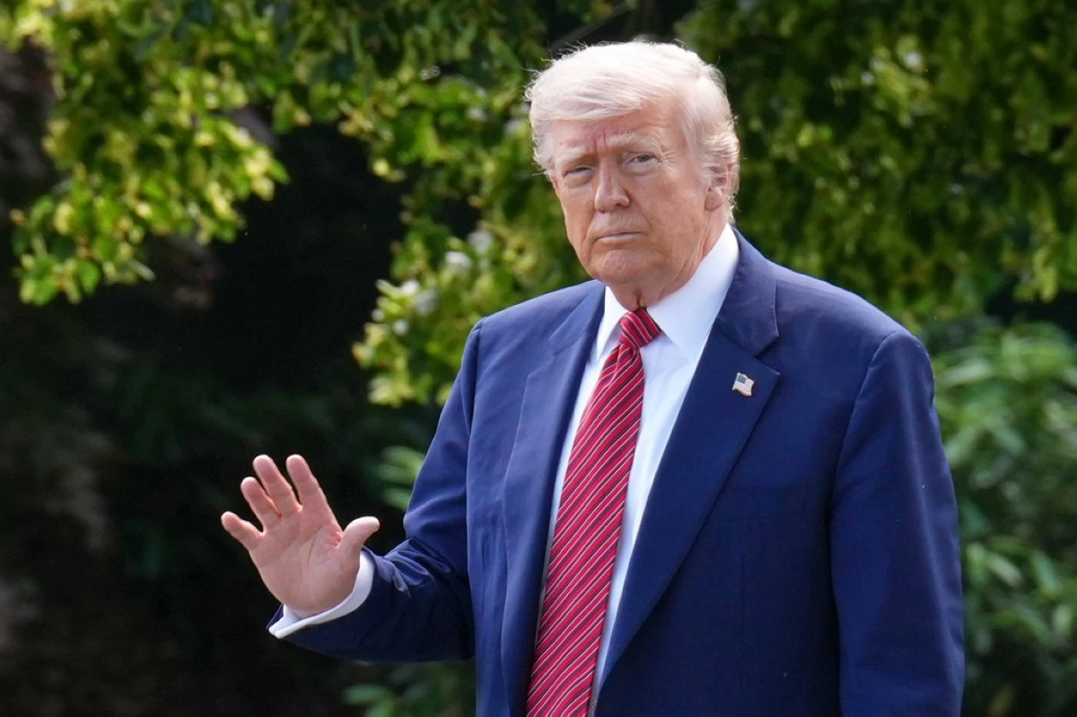President Donald Trump waves as he departs the White House, Friday, May 23, 2025, in Washington. (AP Photo/Jacquelyn Martin)