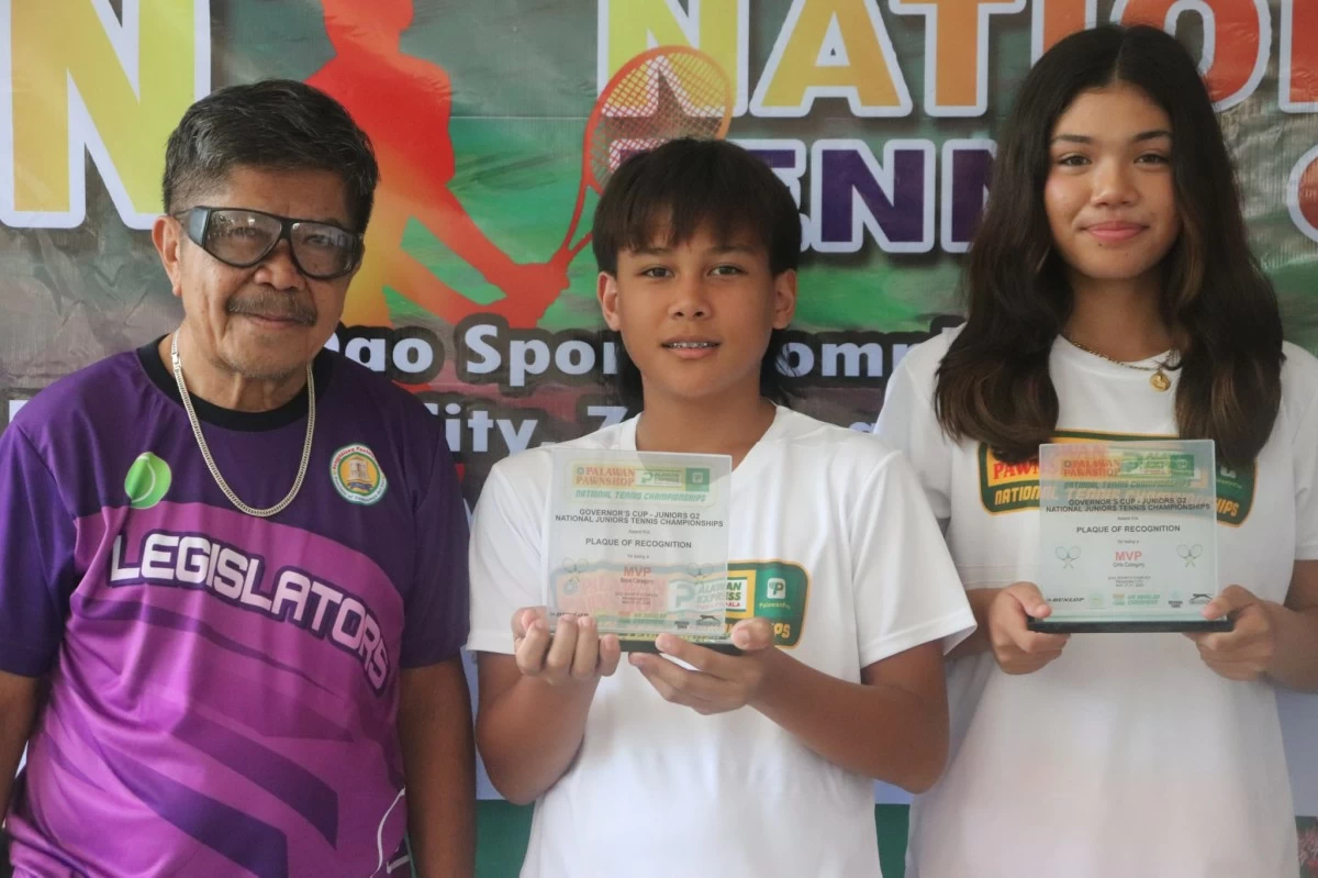 Izabelle Camcam (right) and Tyronne Caro hold their trophies after impressive performances in the Governor’s Cup in Pagadian City. Joining them is Zamboanga del Sur sports coordinator Alfred Cimafranca.