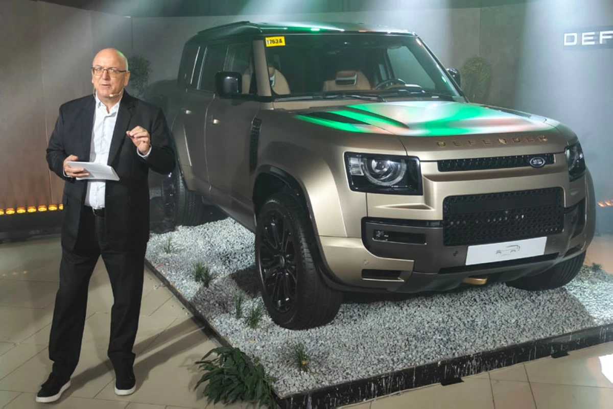 Chris Ward, IC Land Automotive Vice President, and the Defender Octa.