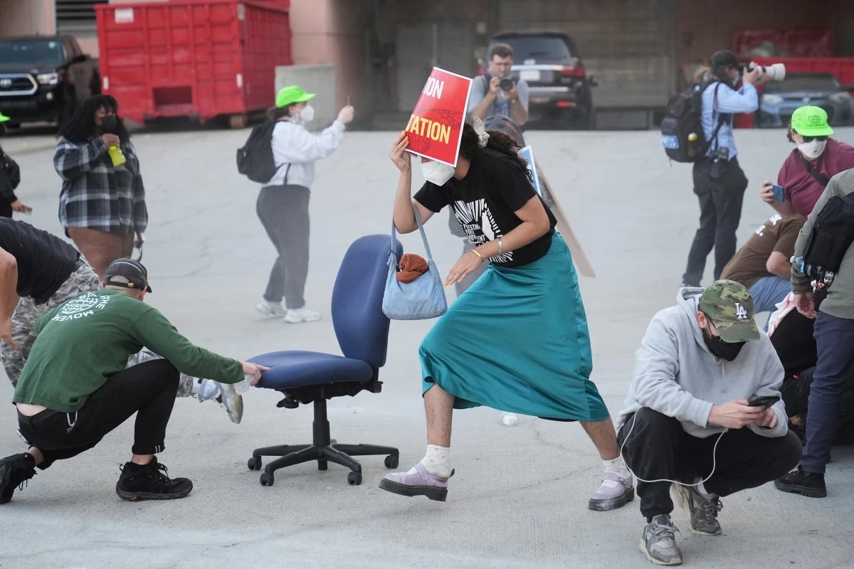 CROWD members react after law enforcement officers fired pepper balls during a protest after federal immigration authorities conducted an operation on Friday, June 6, 2025, in Los Angeles, California. (AP)