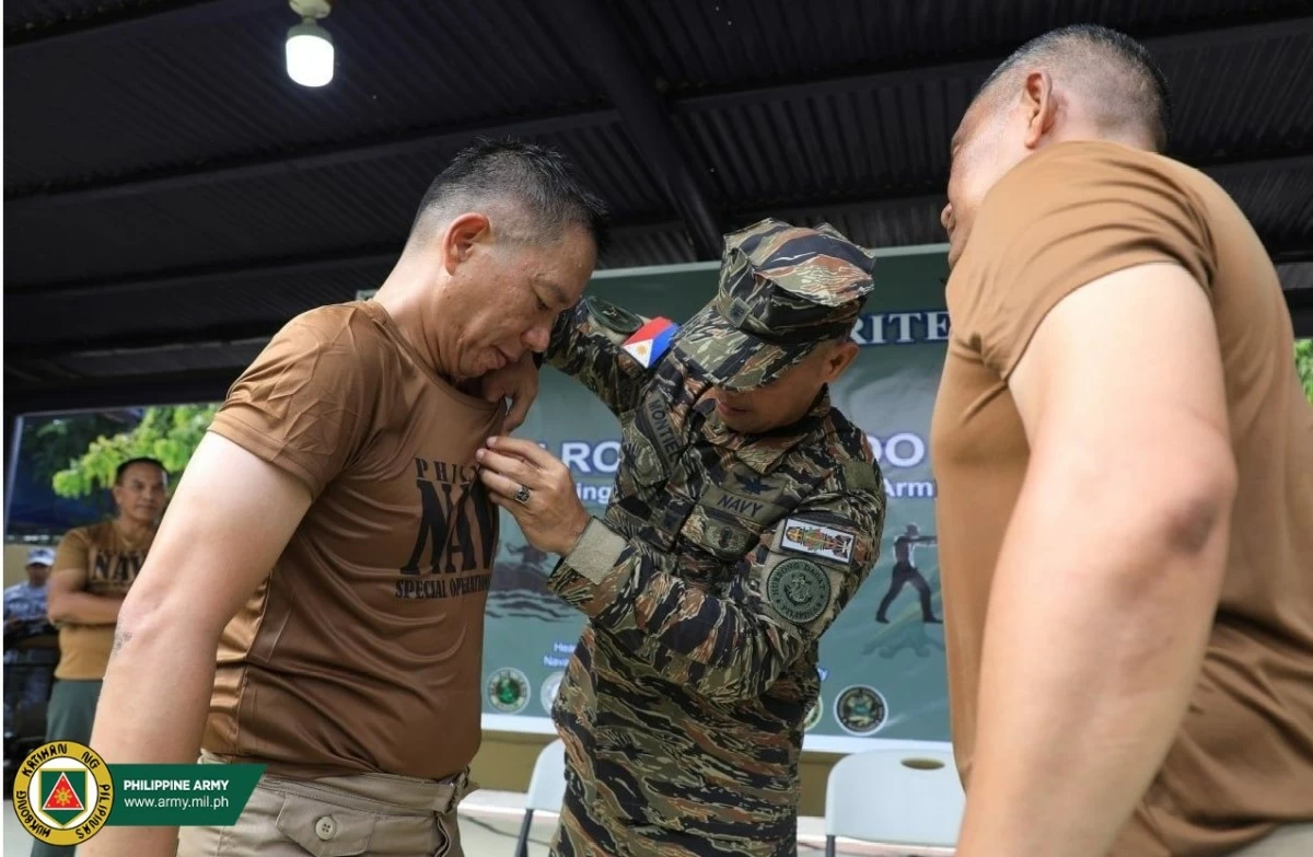 Philippine Army (PA) chief Lt. Gen. Roy Galido earns an honorary badge from the Naval Special Operations Command after joining the rigorous training drills of the Philippine Navy's most elite warriors during a visit at the Naval Base Heracleo Alano in Sangley Point, Cavite on June 7, 2025. (Photo: PA)