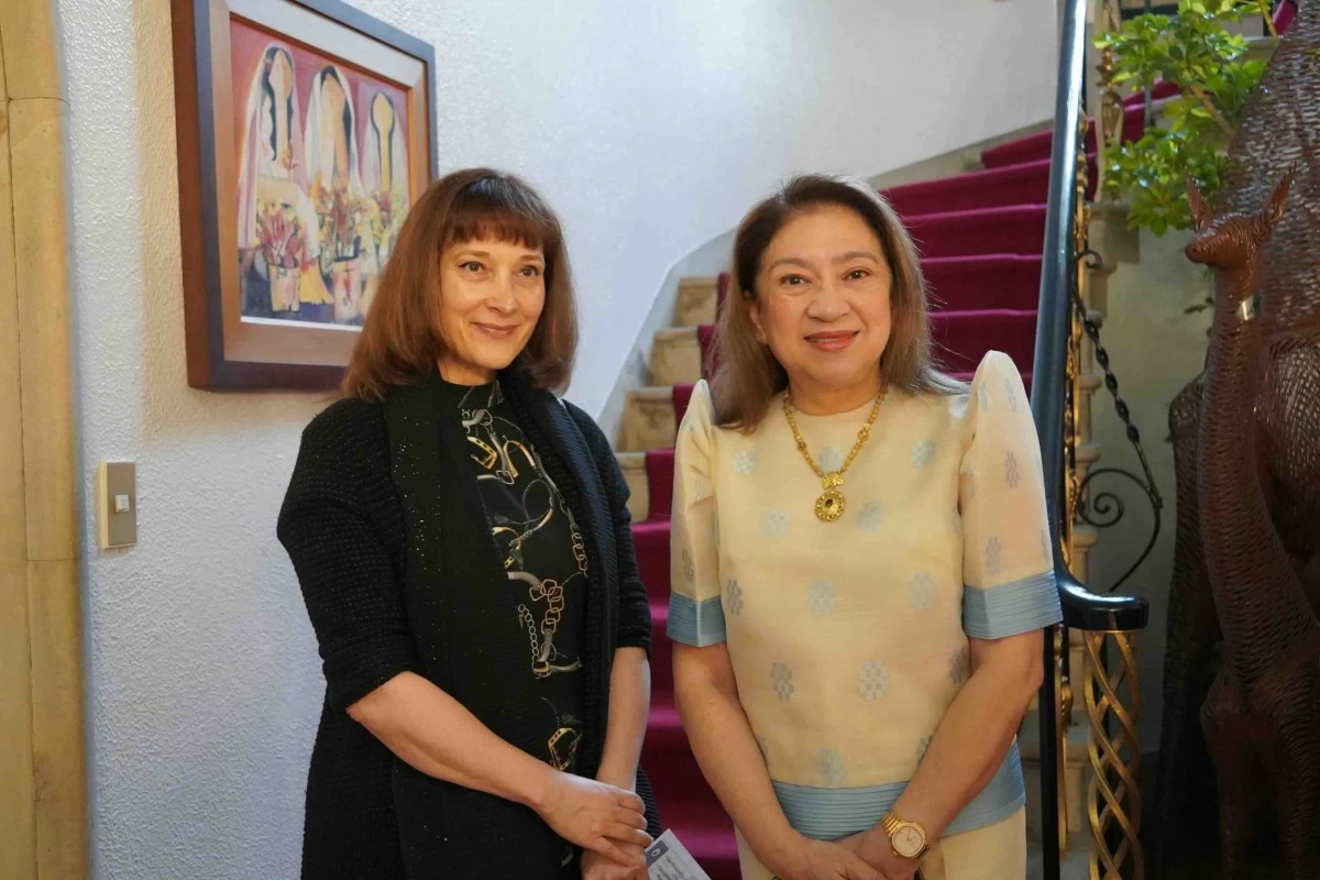 Philippine Ambassador to Japan Mylene J. Garcia-Albano (right) with Valerie Moschetti, president of the Tokyo Women’s Club (TWC) (left) during the TWC Meeting featuring a Philippine cultural presentation on the 'terno' held on May 23, 2025 at the official residence of the Philippine Ambassador in Kudan, Tokyo, Japan.