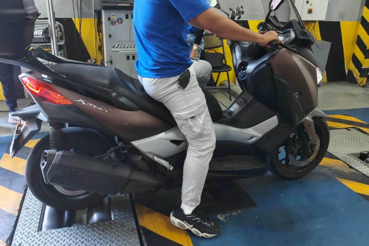 A motorcycle's grip, braking capability, and suspension integrity are being tested.