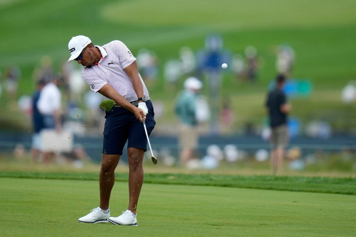 Chase Johnson hits from the fifth fairway during a practice round ahead of the U.S. Open golf tournament at Oakmont Country Club Tuesday, June 10, 2025, in Oakmont, Pa. (AP Photo/Seth Wenig)