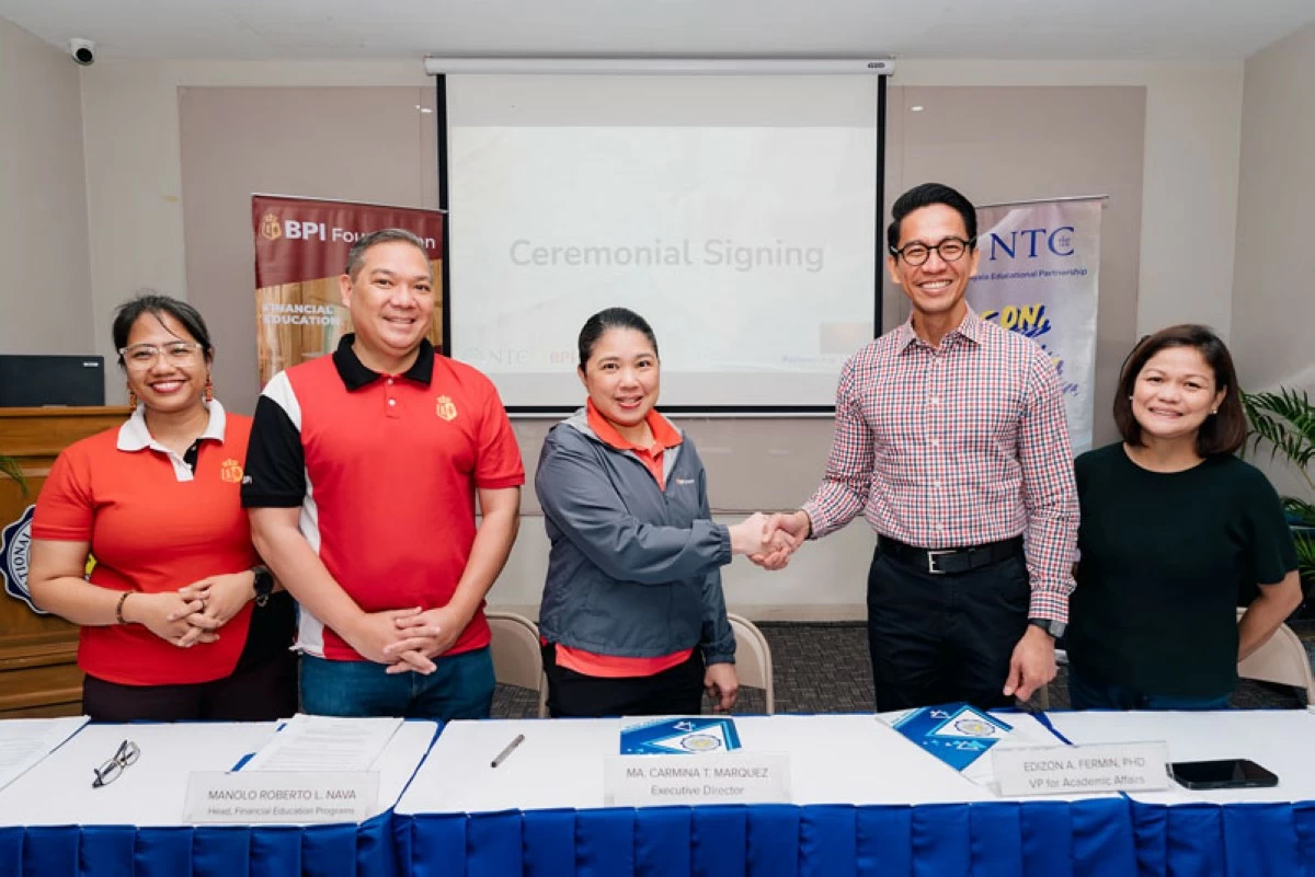 From left: BPI Foundation’s Gjay Malapo, Program Manager; Manolo Nava, Senior Program Manager; and Carmina Marquez, Executive Director; with National Teachers College’s Edizon Fermin, Vice President for Academic Affairs; and Jennifer Buen, Vice President for Finance.