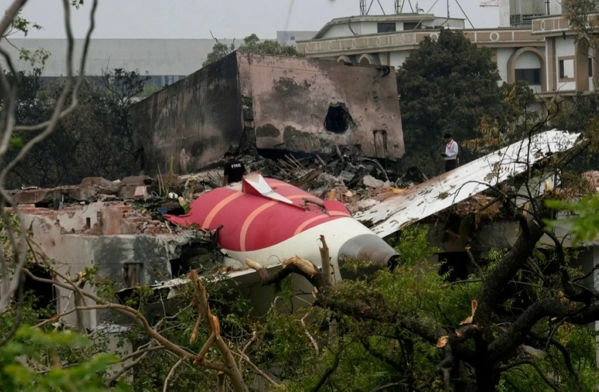 Parts of an Air India plane that crashed on Thursday are seen on top of a building in Ahmedabad, India, Friday, June 13, 2025. (AP Photo/Rafiq Maqbool)