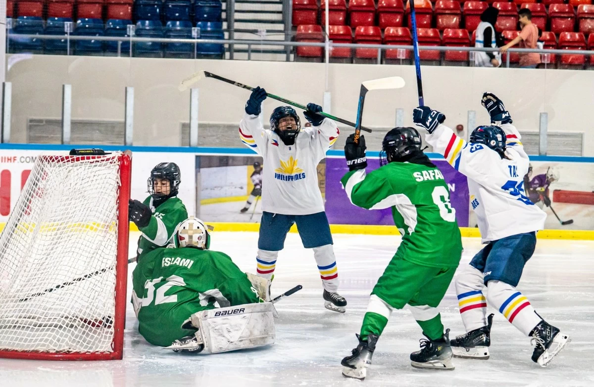 The Philippine Women’s National Ice Hockey Team seals the win with a stunning final shot against Iran – claiming gold at the 2025 International Ice Hockey Federation (IIHF) Women’s Asia Cup held in the United Arab Emirates (UAE). Photo by Norton Qua.
