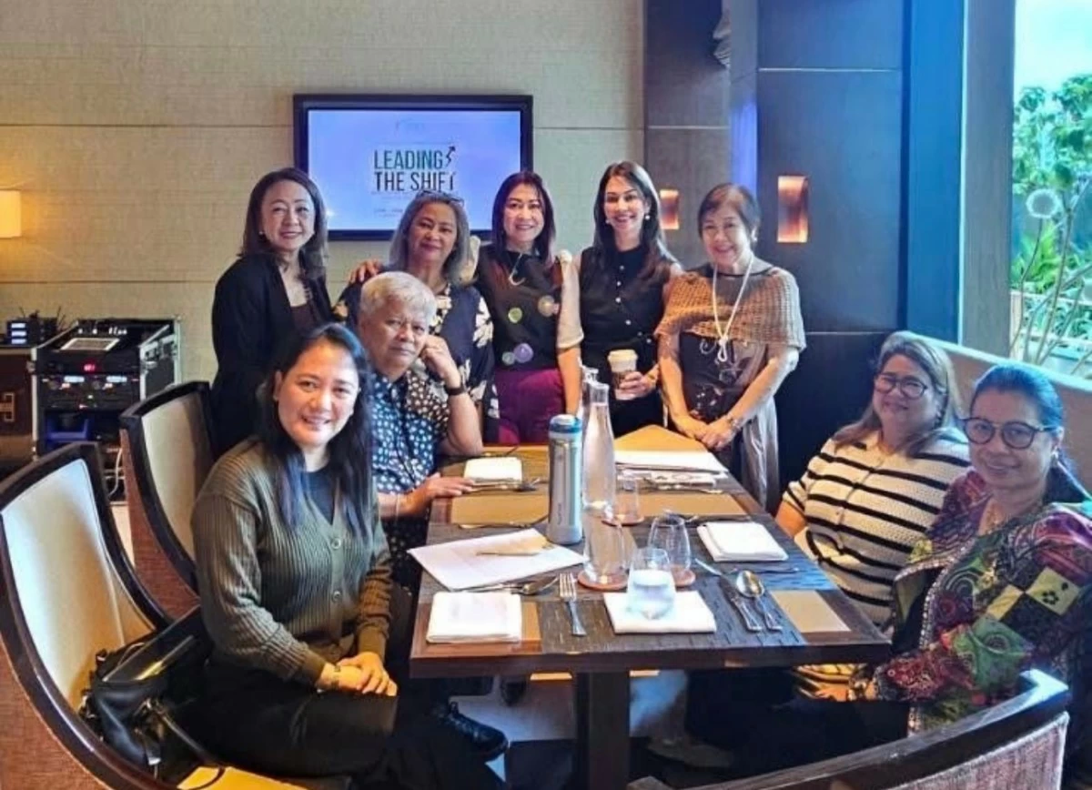 Officers of the HSMA, with members of media.