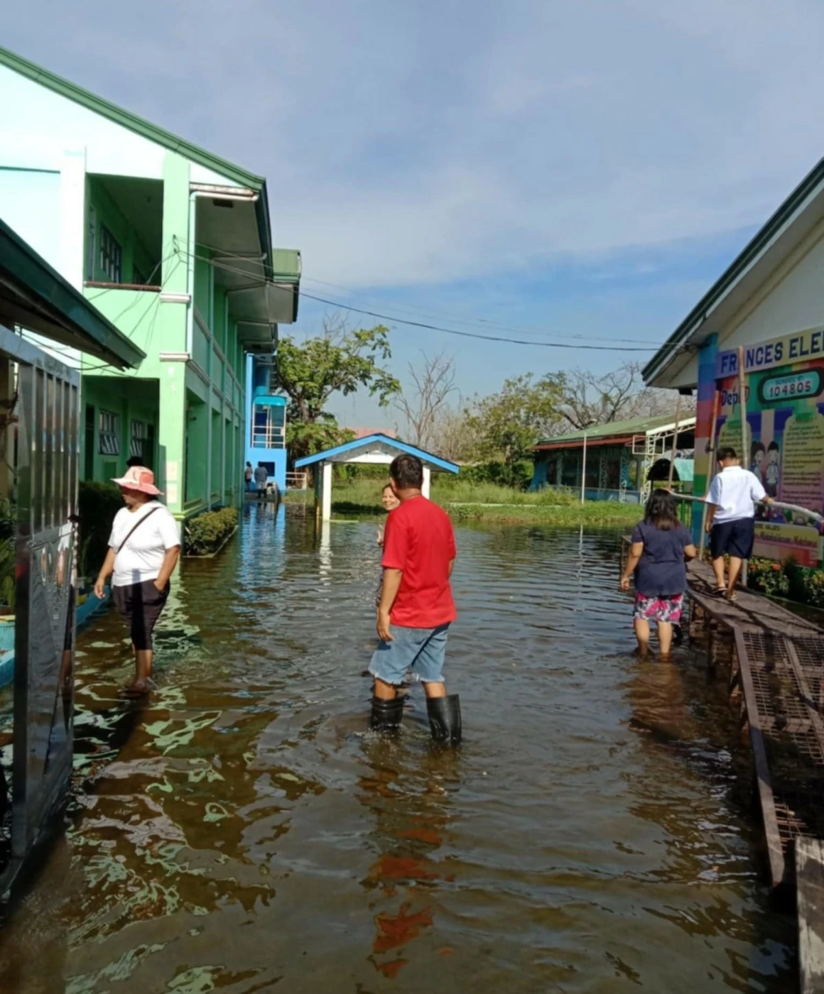 Parents are seen in Frances Elementary School