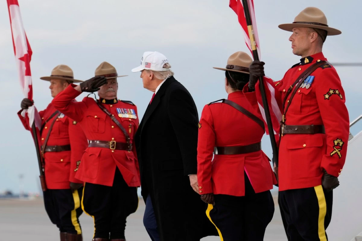 President Donald Trump arrives on Air Force One at Calgary International Airport, Sunday, June 15, 2025, in Calgary, Canada, ahead of the G7 Summit. (AP Photo/Mark Schiefelbein)