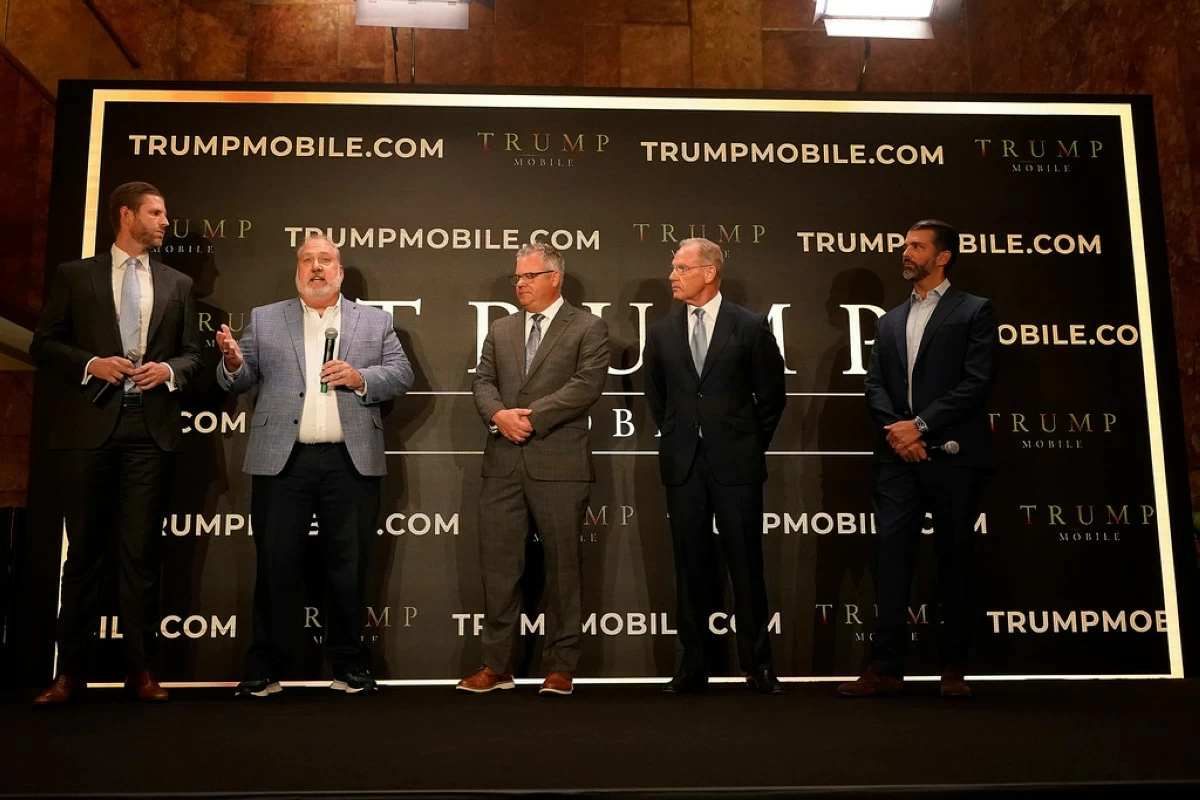 Eric Trump, Don Hendrickson, Eric Thomas, Patrick O'Brien and Donald Trump Jr., left to right, participate in the announcement of Trump Mobile, in New York's Trump Tower, Monday, June 16, 2025. (AP Photo/Richard Drew)