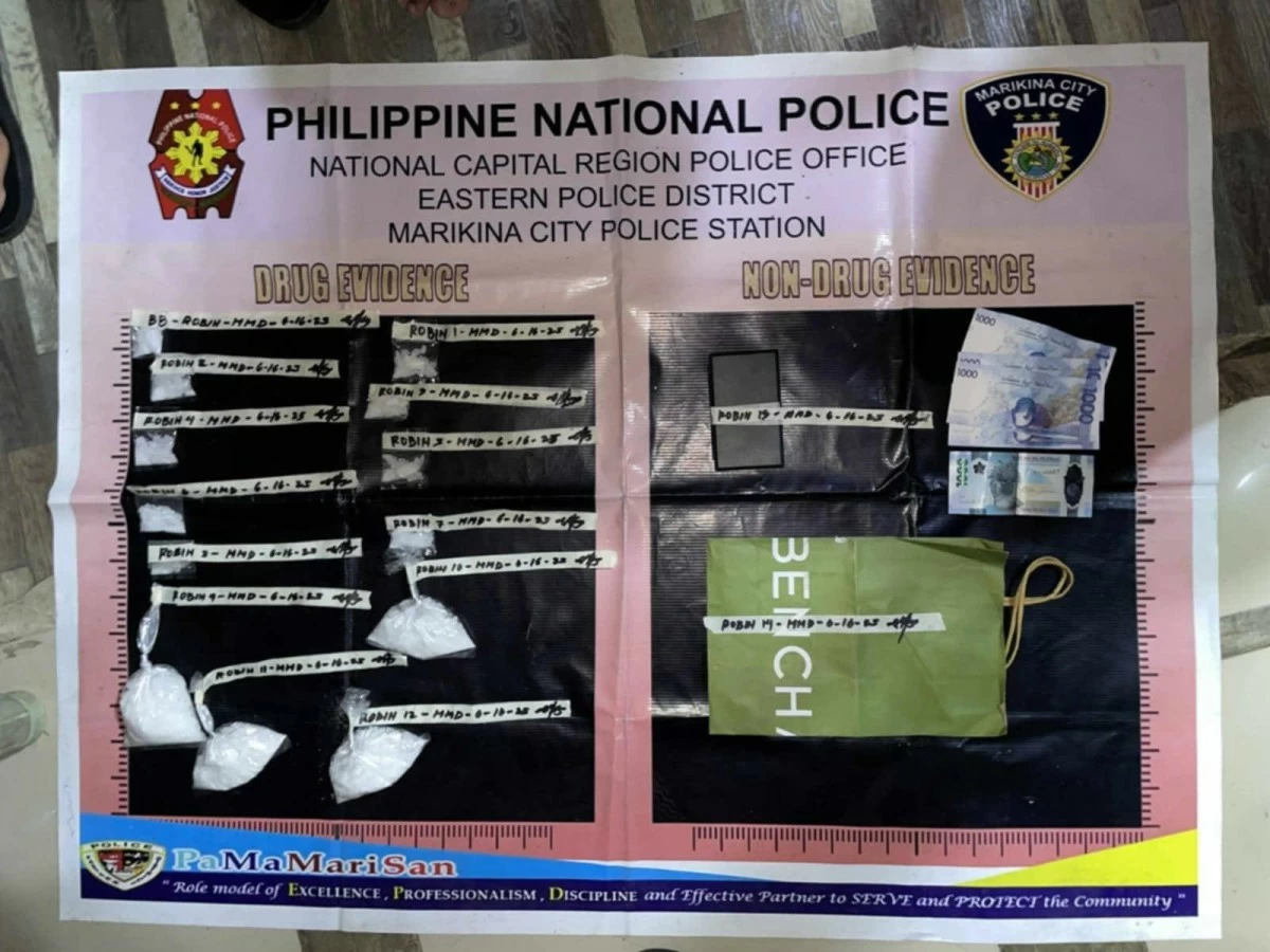 Man (white t-shirt) is arrested again during a buy-bust operation in Marikina City, where P2 million worth of shabu is seized. (Photo from EPD)