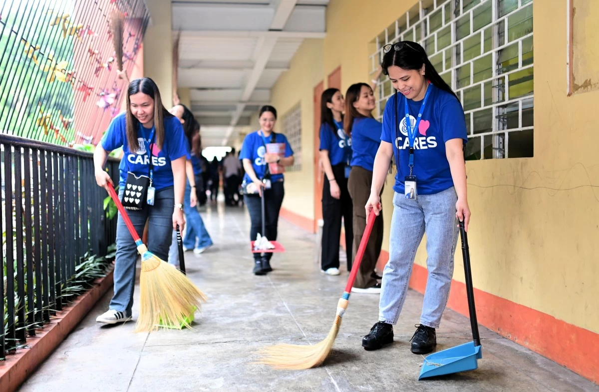 SM North EDSA volunteers sweep hallways for Brigada Eskwela—helping create clean, focused spaces where students can learn and grow.