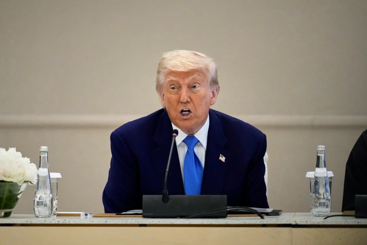 President Donald Trump attends a business meeting and roundtable at Qasr Al Watan, in Abu Dhabi, United Arab Emirates Friday, May 16, 2025. (AP Photo/Altaf Qadri)