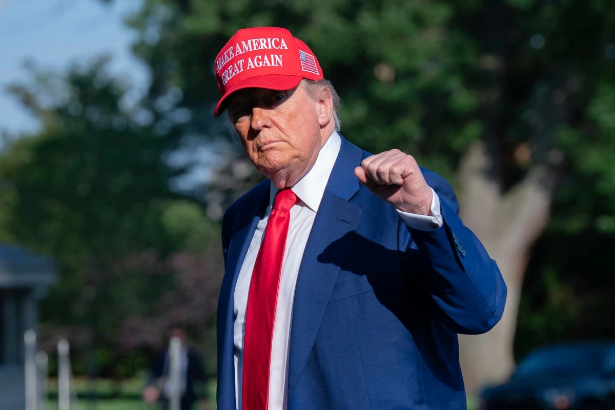 President Donald Trump walks on the South Lawn upon arriving at the White House, Saturday, June 21, 2025, in Washington. (AP Photo/Jose Luis Magana)