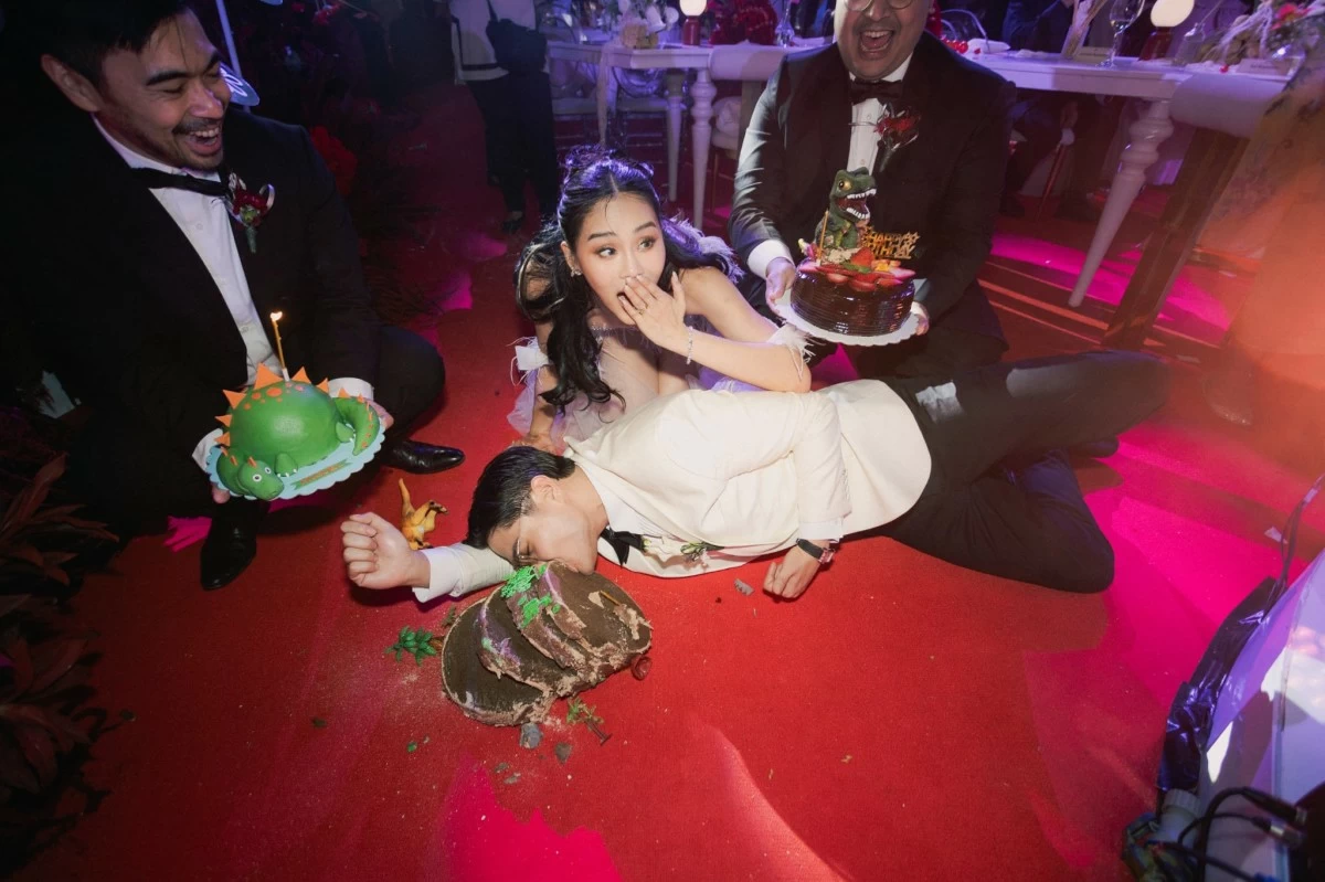 Miguel playfully took a bite of his birthday cake that accidentally fell on the floor