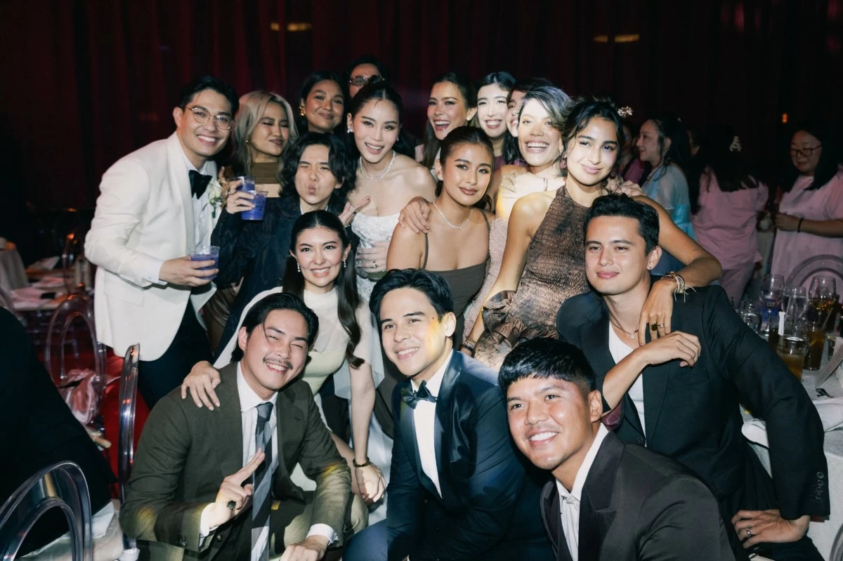 The couple surrounded by their celebrity guests