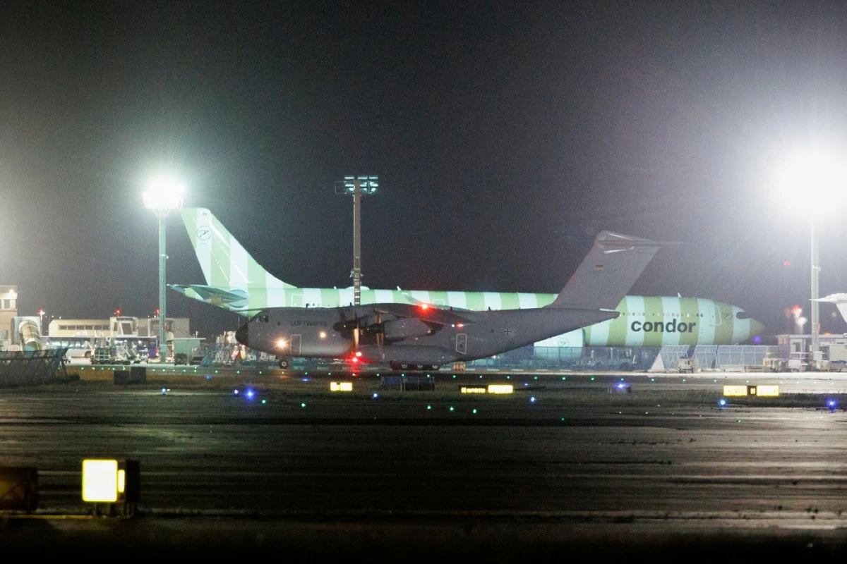 A Bundeswehr Airbus A400M with German Israel returnees on board taxis to its parking position at Frankfurt Airport, due to the war between Israel and Iran, early Tuesday, June 24, 2025. (Lando Hass/dpa via AP)