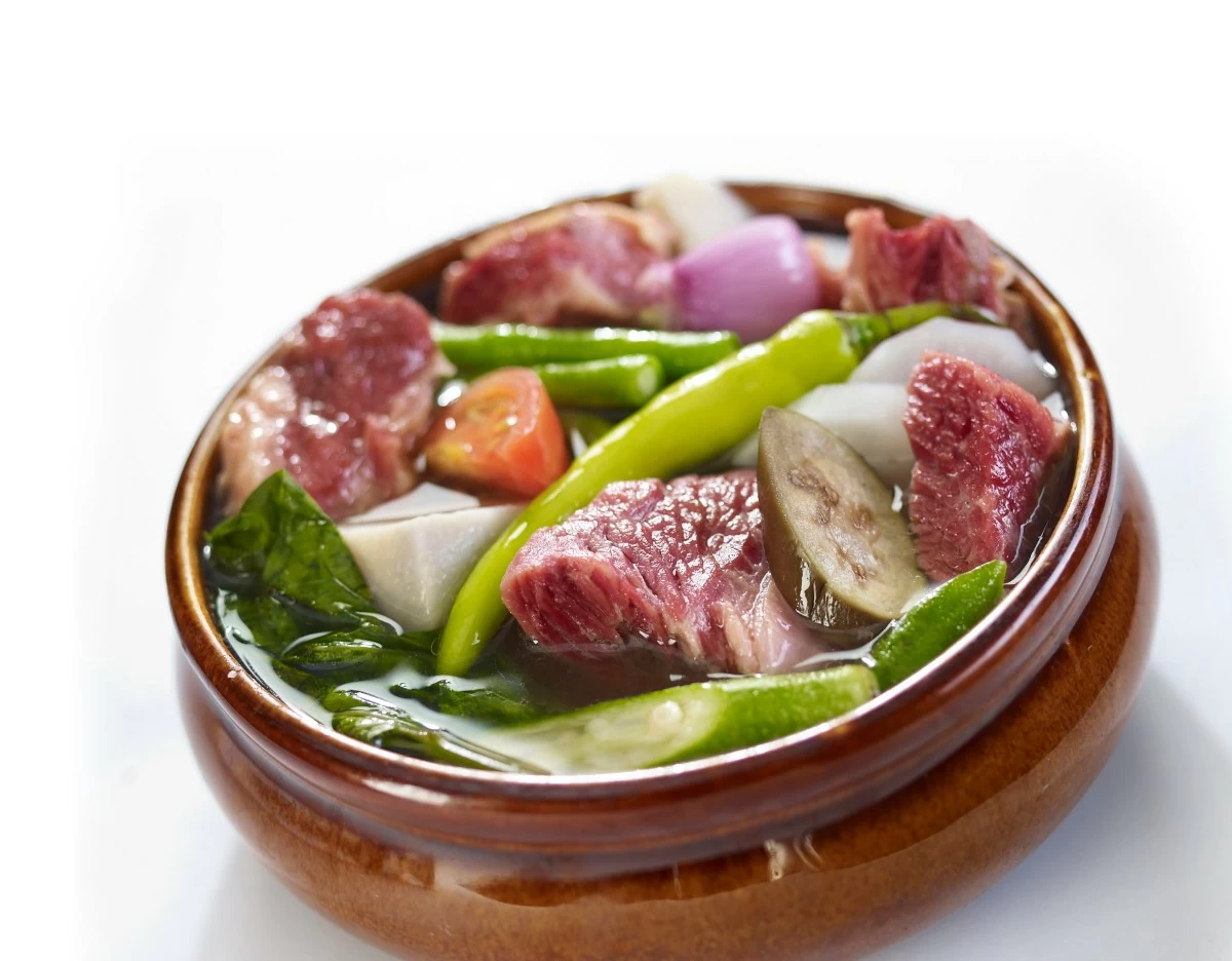 TRUE TASTE A bowl of sinigang made with traditional souring agents like kamias or batuan