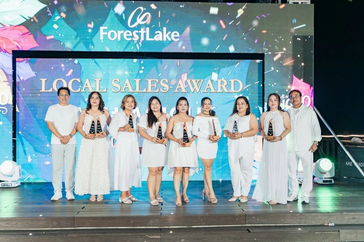 Winners of the Local Sales Award from North Luzon celebrate their achievements during the Local Sales awarding ceremony.
