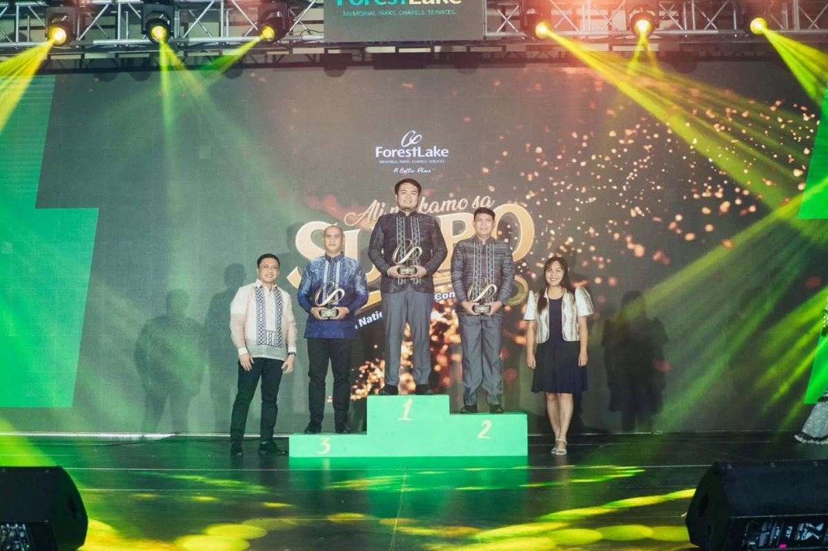 Top 3 National Sales Awardees for Sales Consultants in 2024 — Gilbert B. Pile (Top 3, San Ildefonso, Bulacan), Glenn M. Palencia (Top 2, San Jose, Nueva Ecija), and Lance Allen C. Tonson (Top 1, San Miguel & San Ildefonso, Bulacan) — are recognized on stage for their outstanding sales performance, joined by Forest Lake representatives Erwin Dela Cruz of Sales Admin, and Irene Joyce Santos of MSC Finance.