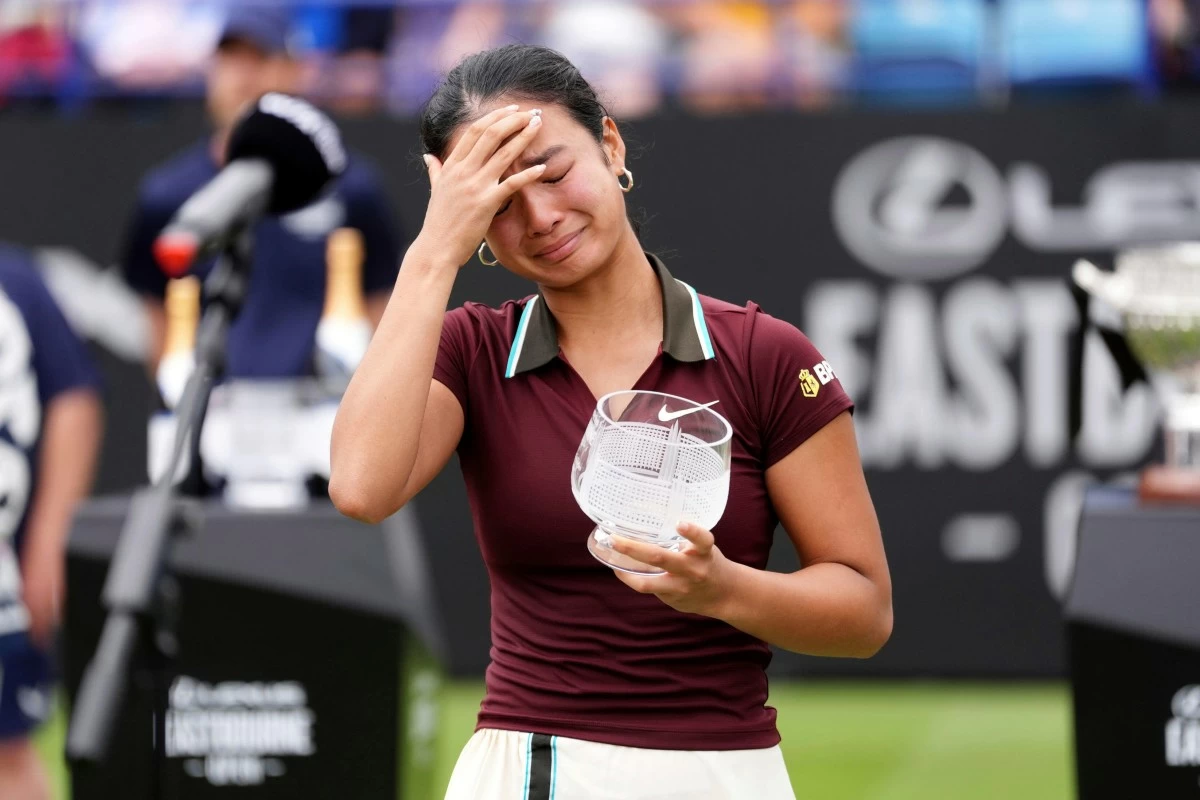 Alexandra Eala of the Philippines with the runners up trophy after the Women's singles Final during day six of the Eastbourne Open at Devonshire Park Lawn Tennis Club, Eastbourne, England, Saturday June 28, 2025. (Adam Davy/PA via AP)